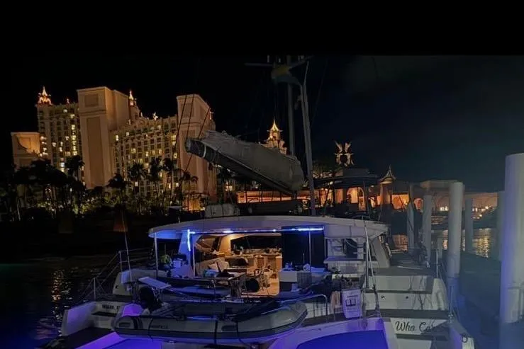 Slide: The Image of Sailing yacht NEEL 51 silhouetted against a vibrant sunset, 2020. - 3