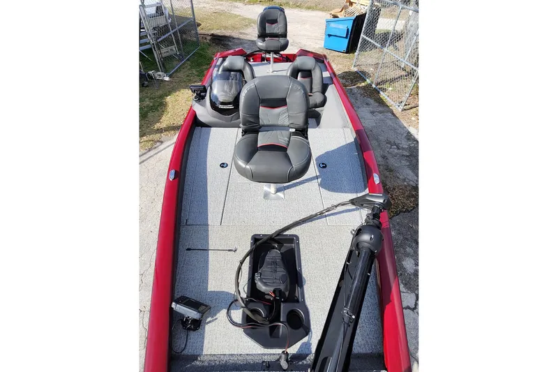 Slide: The Image of 2021 Tracker Pro Team 175 TXW Tournament Edition fishing boat with red trim and seating. - 10