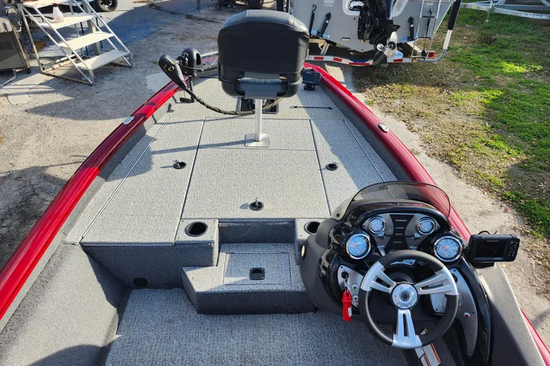 Slide: The Image of 2021 Tracker Pro Team 175 TXW Tournament Edition boat interior with steering console. - 18