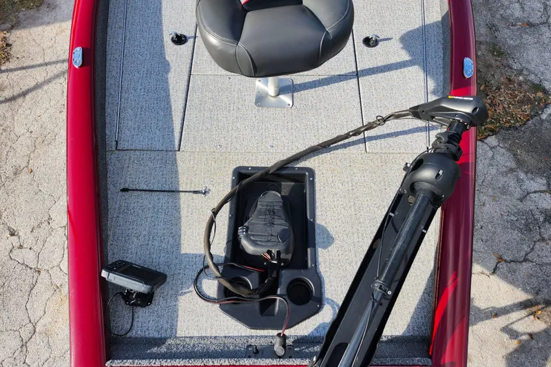 Slide: The Image of 2021 Tracker Pro Team 175 TXW Tournament Edition boat deck with seat and trolling motor. - 22