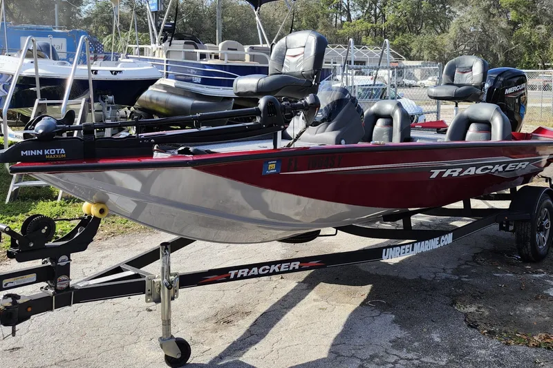 Slide: The Image of 2021 Tracker Pro Team 175 TXW Tournament Edition boat on trailer, featuring Minn Kota Maxxum motor. - 3