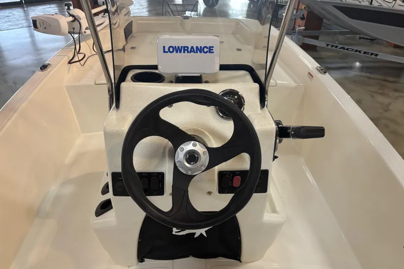 Slide: The Image of Interior view of 2024 Mako Pro Skiff 15 CC with steering console. - 6