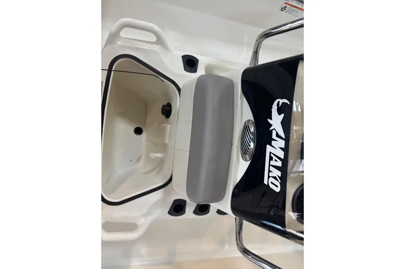 Slide: The Image of 2024 Mako Pro Skiff 15 CC seat and storage area. - 8