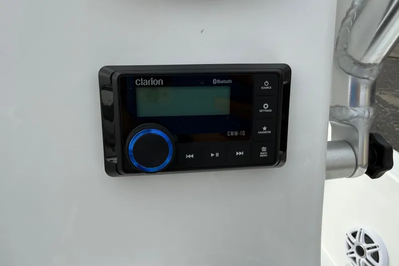 Slide: The Image of Clarion Bluetooth audio system on 2026 Blazer PureBay 2200 boat console. - 19