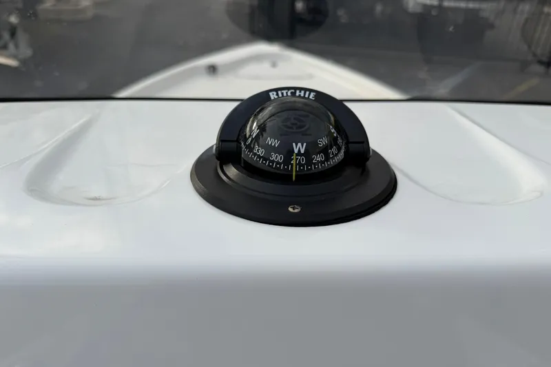 Slide: The Image of Compass on 2026 Blazer PureBay 2200 boat dashboard, showing west direction. - 20