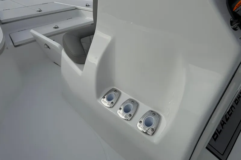 Slide: The Image of 2026 Blazer PureBay 2200 boat interior with seating and storage compartments. - 25