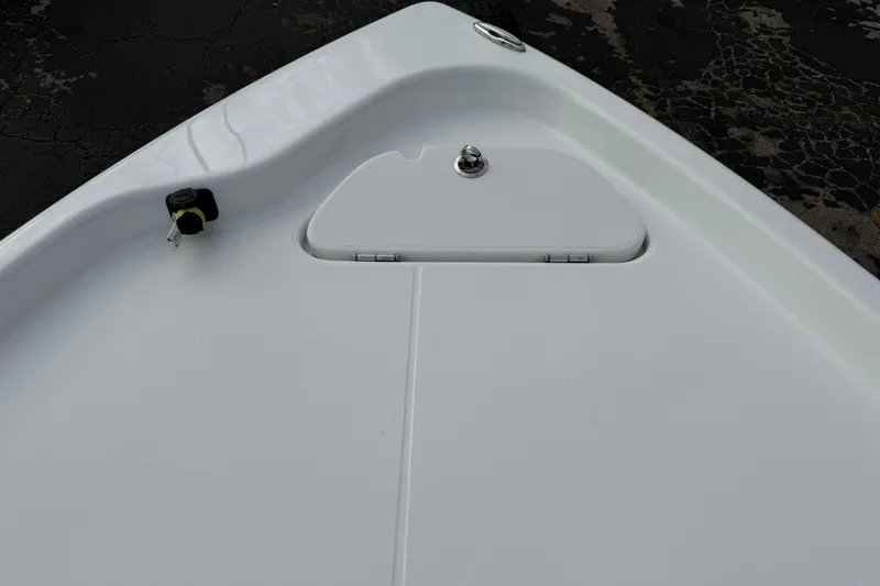 Slide: The Image of 2026 Blazer PureBay 2200 boat deck with storage compartment and fittings. - 36