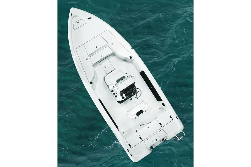 Slide: The Image of Manufacturer Provided Image: 2026 Blazer PureBay 2200 boat on turquoise water, aerial view. - 45