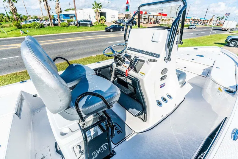 Slide: The Image of Manufacturer Provided Image: 2026 Blazer PureBay 2200 boat interior with steering console and seating. - 47