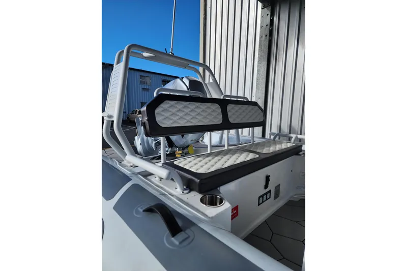 Slide: The Image of 2026 Highfield Sport 560 boat interior with cushioned seating and modern design. - 8