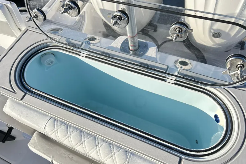 Slide: The Image of Livewell on 2026 Sea Fox 288 Commander boat, featuring a sleek design and secure lid. - 10