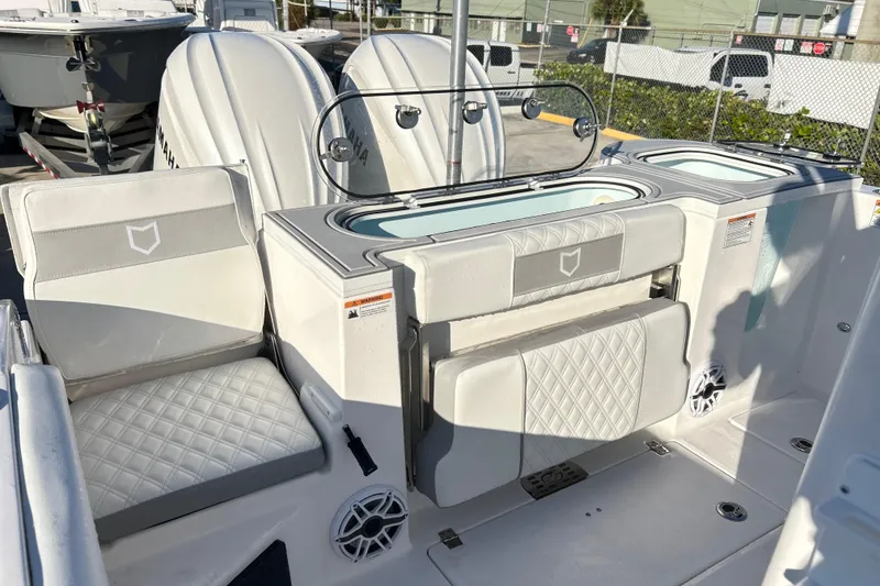 Slide: The Image of 2026 Sea Fox 288 Commander boat interior with seating and storage compartments. - 14