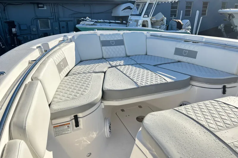 Slide: The Image of 2026 Sea Fox 288 Commander boat with cushioned seating and sleek design. - 15