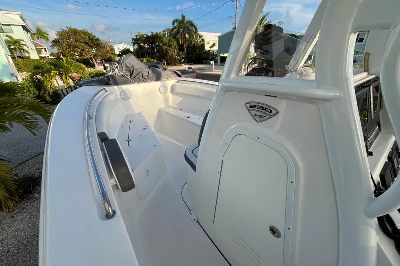 Slide: The Image of 2017 Tidewater 230 CC Adventure boat interior with sleek design and modern features. - 17