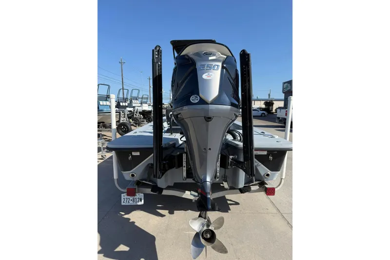 Slide: The Image of 2018 Blazer Bay 2420 GTS boat with powerful outboard motor, rear view. - 15