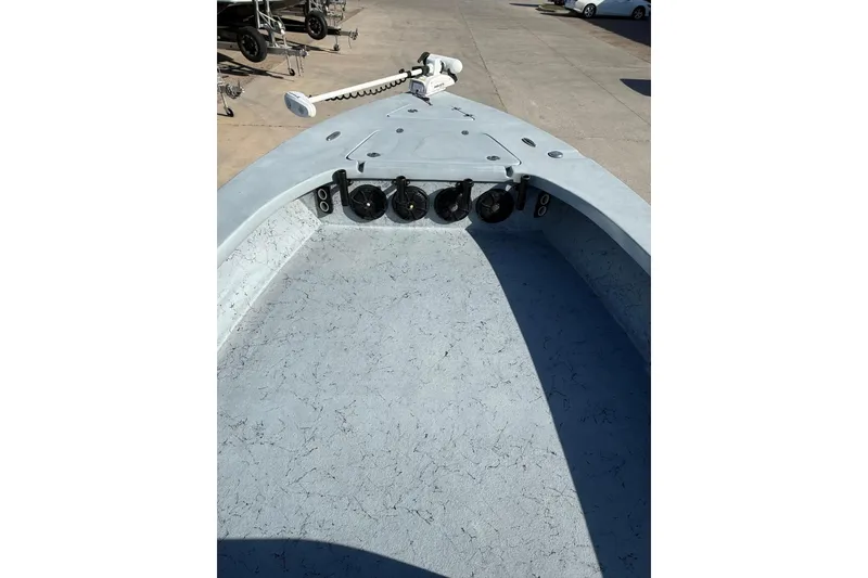 Slide: The Image of 2018 Blazer Bay 2420 GTS boat interior with trolling motor and speakers. - 19