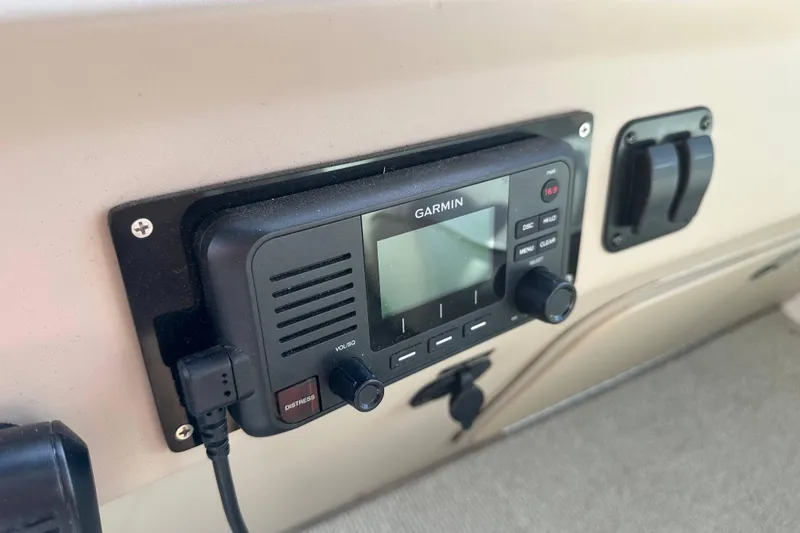 Slide: The Image of Garmin marine radio on 2002 Sea Ray 340 Sundancer dashboard. - 17