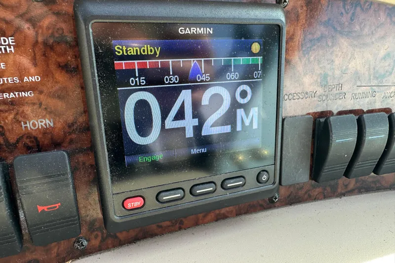 Slide: The Image of Garmin display on 2002 Sea Ray 340 Sundancer showing 42 meters in standby mode. - 18