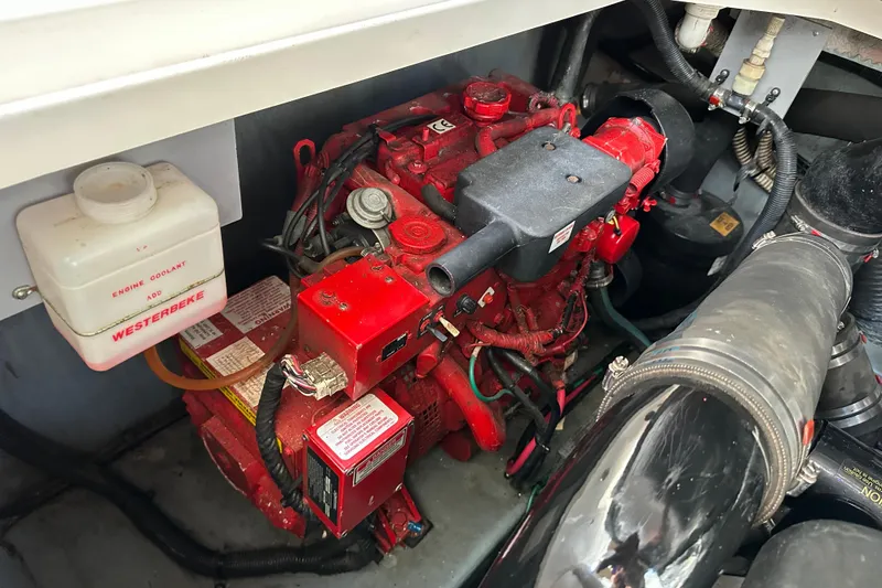 Slide: The Image of Engine compartment of a 2002 Sea Ray 340 Sundancer with Westerbeke generator. - 21