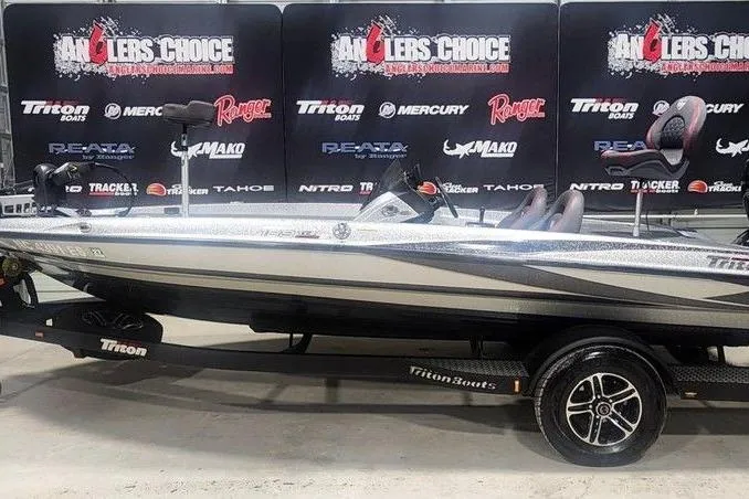 Slide: The Image of 2021 Triton 189 TrX bass boat displayed at Anglers Choice event. - 1