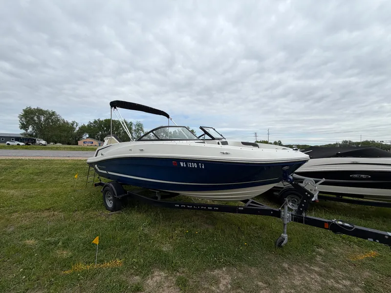 The Image of 2019 Bayliner V45 boat on trailer, cloudy sky. - 0