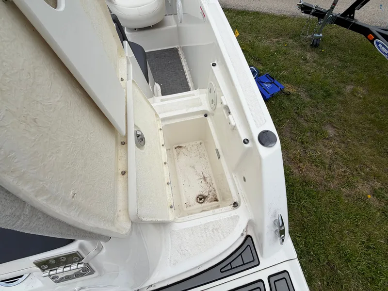 Slide: The Image of Open storage compartment on a 2019 Bayliner V45 boat. - 15