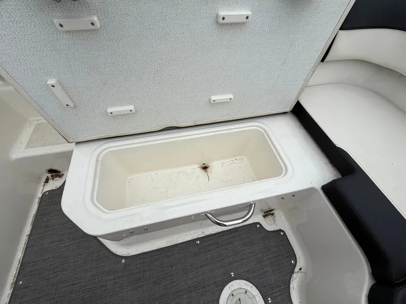 Slide: The Image of Open storage compartment on a 2019 Bayliner V45 boat. - 34