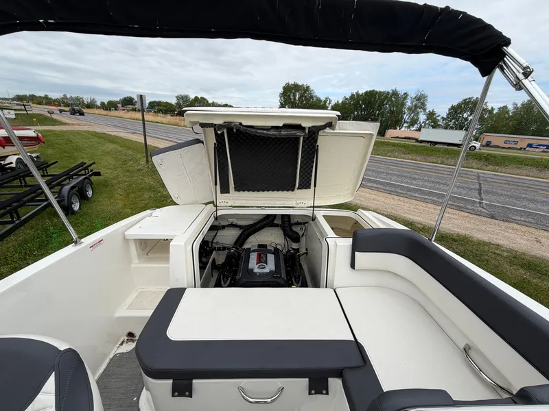 Slide: The Image of Engine compartment of a 2019 Bayliner V45 boat, open on a trailer. - 35