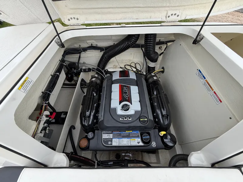 Slide: The Image of Engine compartment of a 2019 Bayliner V45 boat with 4.5L engine. - 36