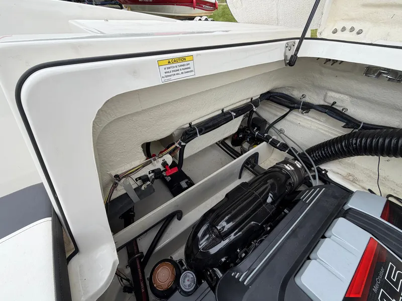 Slide: The Image of Engine compartment of a 2019 Bayliner V45 with visible components. - 38