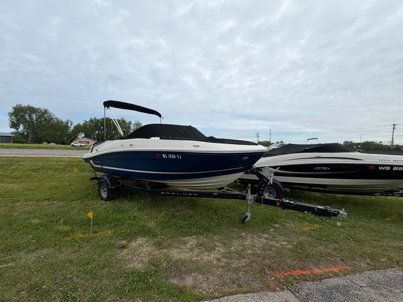Slide: The Image of 2019 Bayliner V45 boat parked on trailer outdoors. - 4