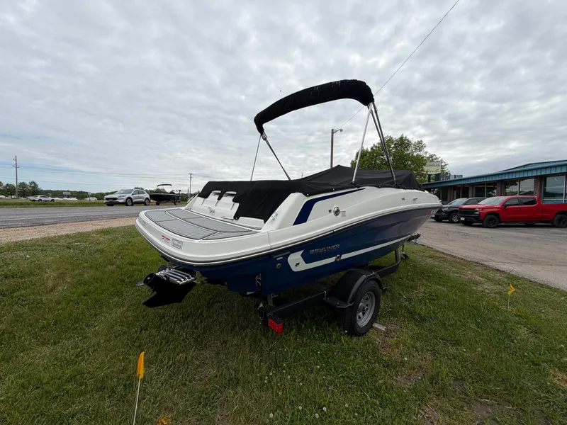 Slide: The Image of 2019 Bayliner V45 boat on trailer, side view. - 7