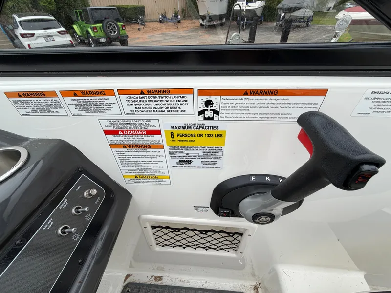 Slide: The Image of Bayliner V45 2019 control panel with warning labels and capacity information. - 21