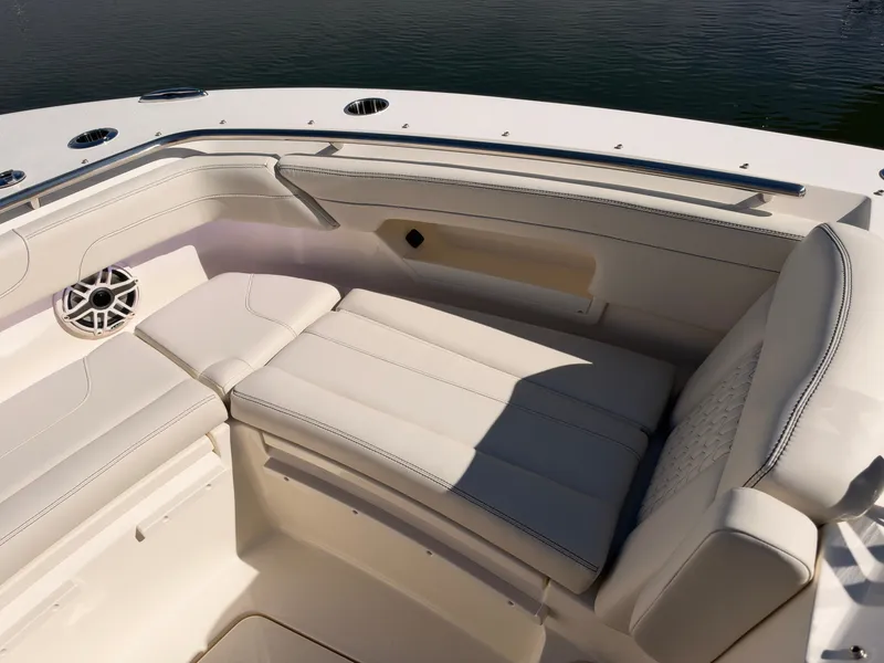 Slide: The Image of The 2027 Scout 288 Dorado features luxurious cream-colored upholstery in the seating area. - 46