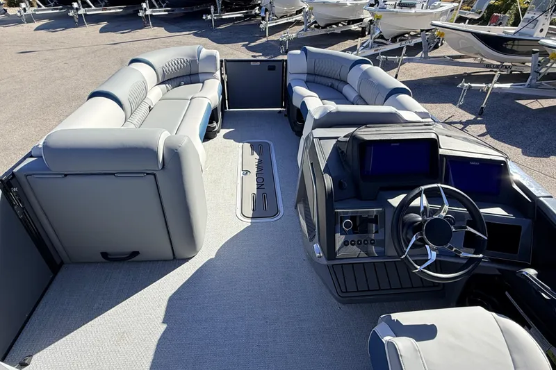 Slide: The Image of 2026 Avalon 2585 Excalibur LTD Flex Lounge interior with modern helm and plush seating. - 15