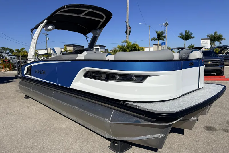 Slide: The Image of 2026 Avalon 2585 Excalibur LTD Flex Lounge Tri Toon boat, high performance, sleek design. - 6