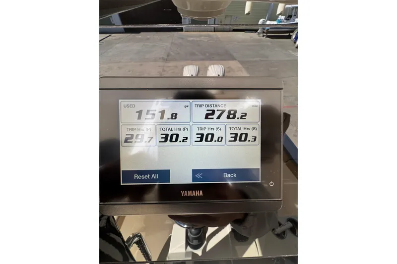 Slide: The Image of Yamaha display showing fuel usage and trip data on a 2025 Scout 260 LXF boat. - 33
