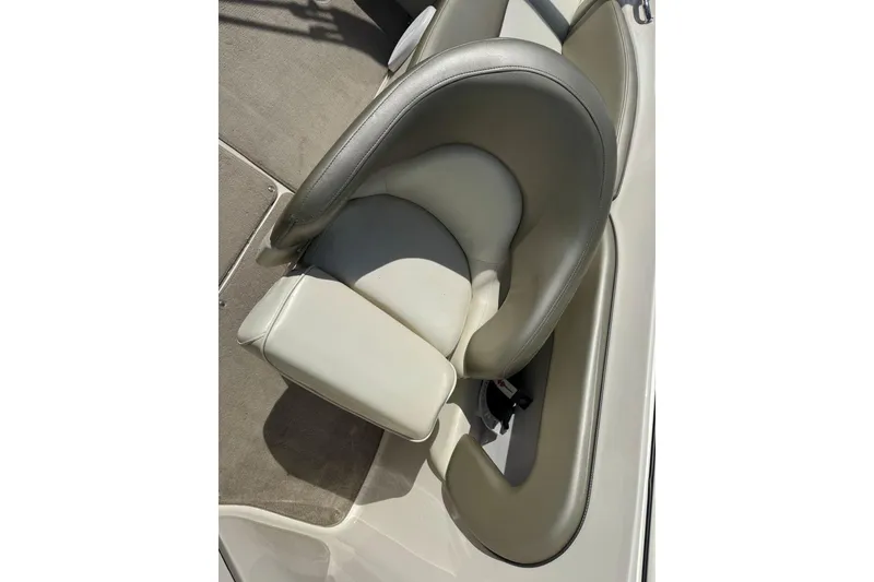 Slide: The Image of 2006 Sea Ray 240 Sundeck boat seat, beige and gray upholstery, top view. - 21