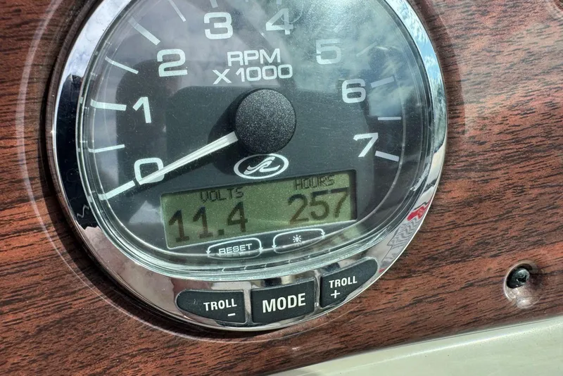 Slide: The Image of Close-up of 2006 Sea Ray 240 Sundeck tachometer showing 257 hours and 11.4 volts. - 37