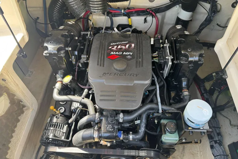 Slide: The Image of Engine compartment of a 2006 Sea Ray 240 Sundeck with MerCruiser 350 MAG MPI. - 38