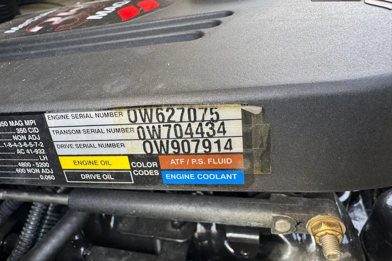 Slide: The Image of Engine serial numbers on a 2006 Sea Ray 240 Sundeck boat engine. - 39