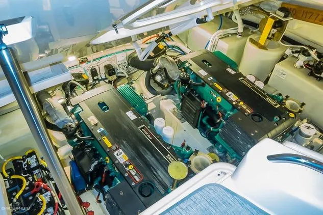 Slide: The Image of Engine room of a 2007 Tiara Yachts 4300 Sovran, showcasing dual engines and mechanical components. - 15