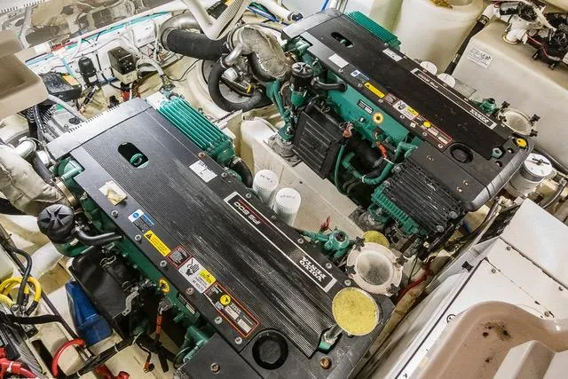 Slide: The Image of Engine room of 2007 Tiara Yachts 4300 Sovran, featuring dual marine engines. - 16