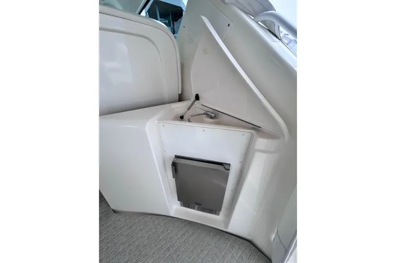 Slide: The Image of 2006 Tiara Yachts 4300 Sovran interior detail with built-in storage compartment. - 21