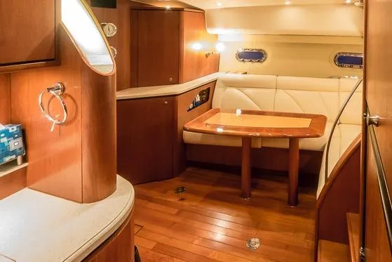 Slide: The Image of Luxurious 2007 Tiara Yachts 4300 Sovran interior with elegant wood and leather finishes. - 9