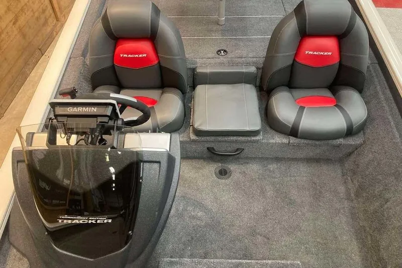 Slide: The Image of 2025 Tracker Pro Team 175 boat interior with Garmin system and dual seats. - 10