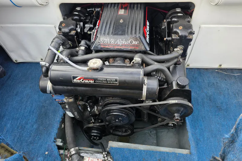 Slide: The Image of Engine of 1990 Sea Ray 210 Bow Rider with MerCruiser Alpha One system. - 17