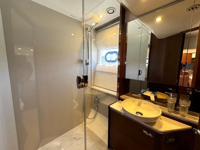 Slide: The Image of Luxurious bathroom with modern shower and stylish sink on a Princess V50 yacht. - 40