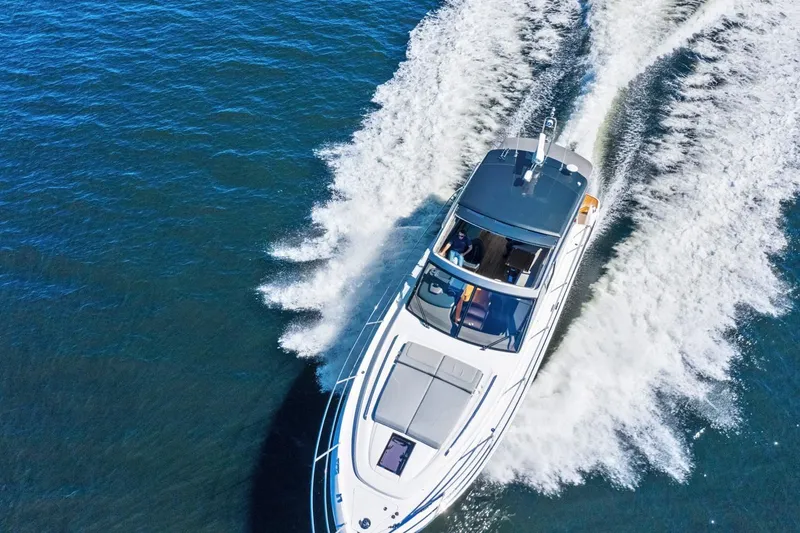 Slide: The Image of Aerial view of a 2020 Princess V50 yacht in motion. - 7