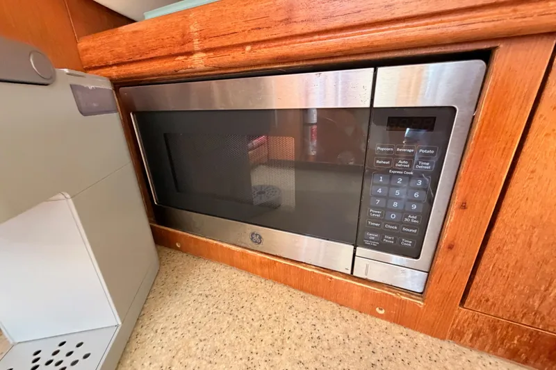 Slide: The Image of Built-in GE microwave in 2007 Hunter 44 Deck Salon yacht kitchen. - 39